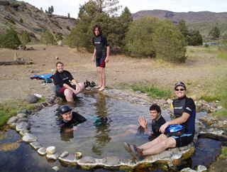 Kayakers from Accommodation Tahoe vacation rentals stop at the hot spring half way point on the North fork of the Carson River for a soak